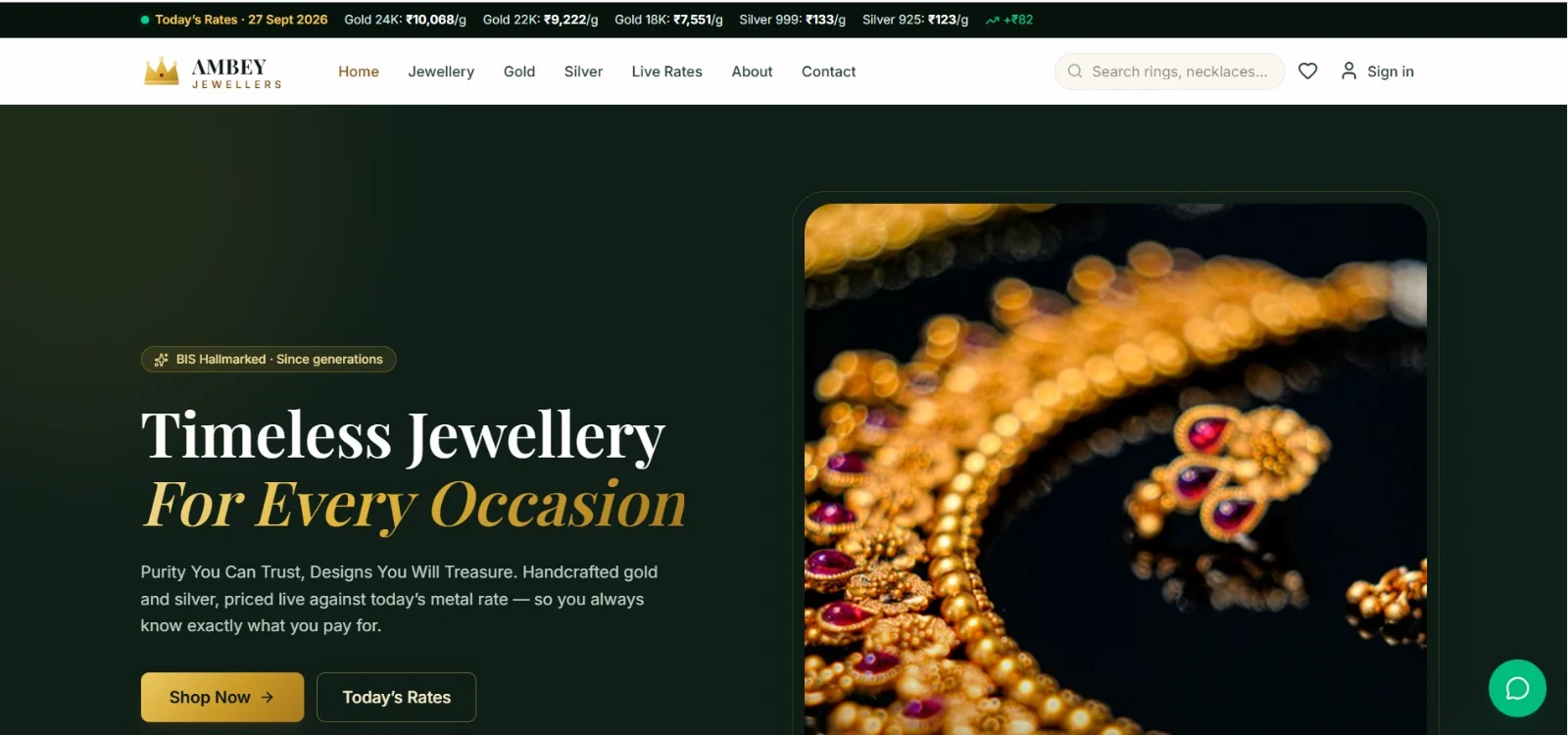 Jewellery e-commerce website home page for Ambey Jewellers with a live gold and silver rate ticker and a gold jewellery banner